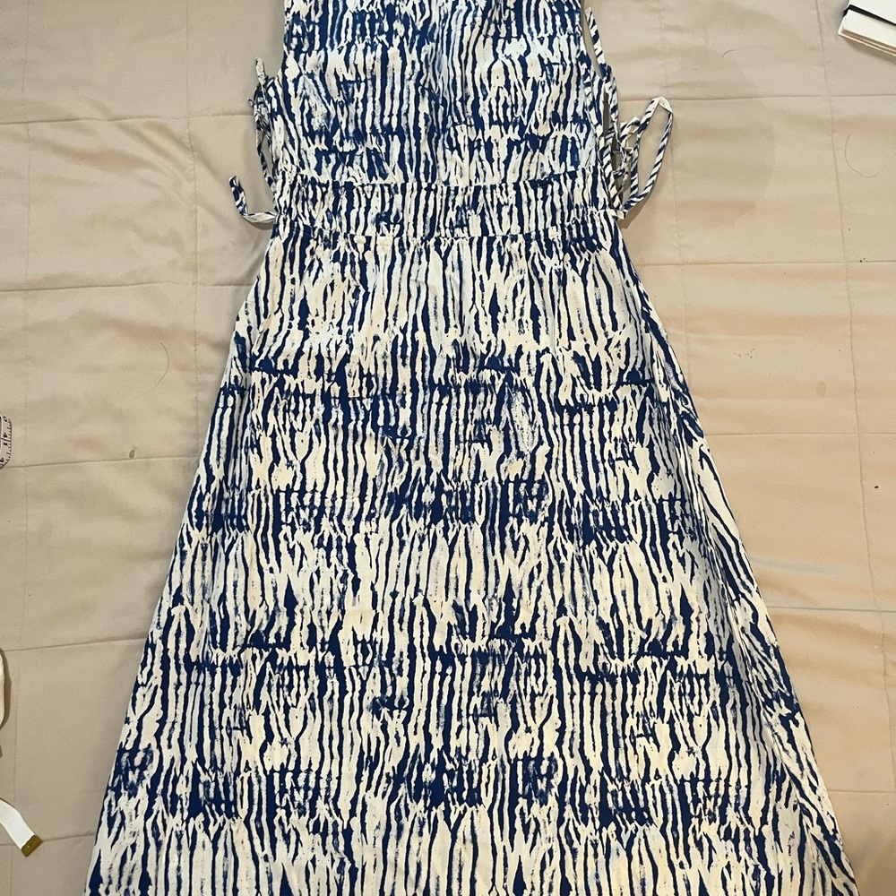 A new dress with out tags blue and white brand name